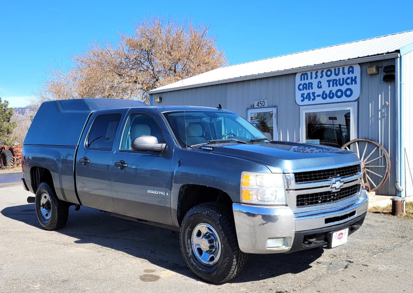 2008 Blue /Tan Chevrolet Silverado 2500HD LT (1GCHK23628F) with an 6.6L engine, 5 Speed Automatic transmission, located at 450 N Russell, Missoula, MT, 59801, (406) 543-6600, 46.874496, -114.017433 - 6.6 Duramax Diesel. Automatic Transmission. 4WD. Matching leer Topper. New Tires. AM FM CD. Power drivers Seat. Air Cruise Tilt. - Photo #1